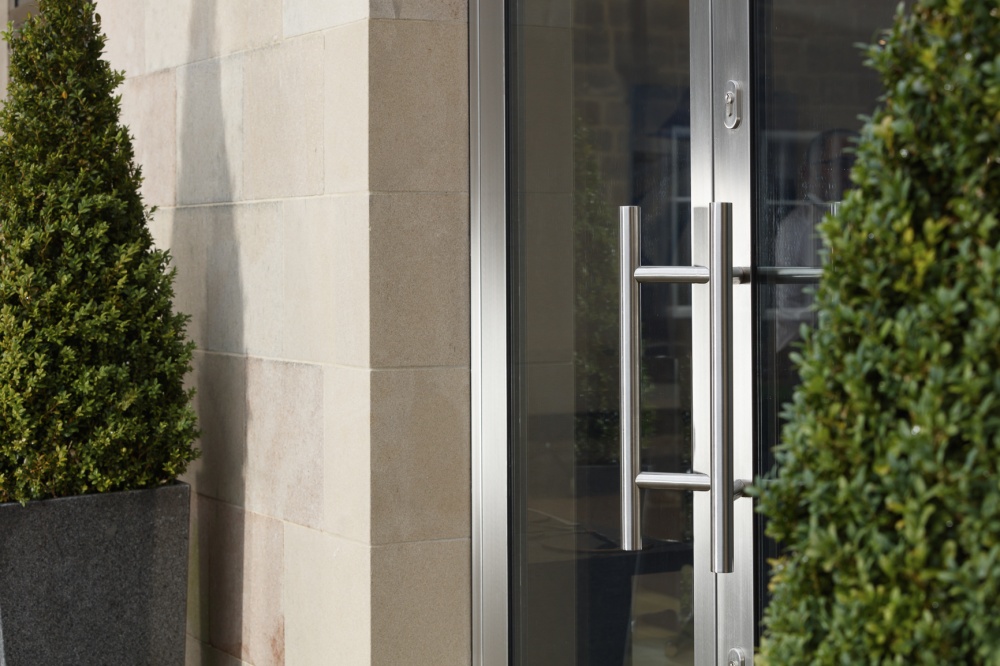Pull handles to the entrance door